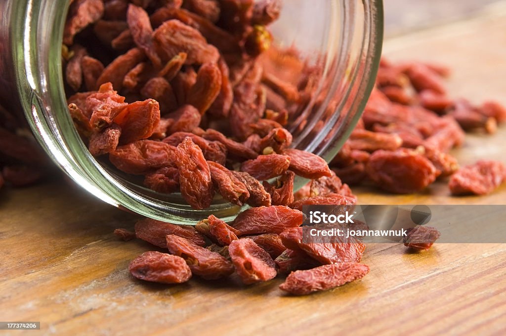 Inclusi frutti di bosco di goji secche rosso - Foto stock royalty-free di Alimentazione non salutare