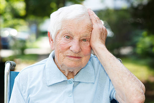 istock Happy senior lady in wheelchair 177374545