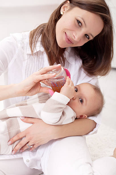 istock Baby girl held by her mother 177374556