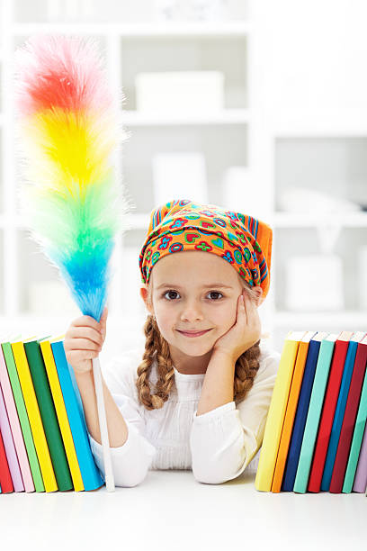 istock Little girl dusting in her room 177374557