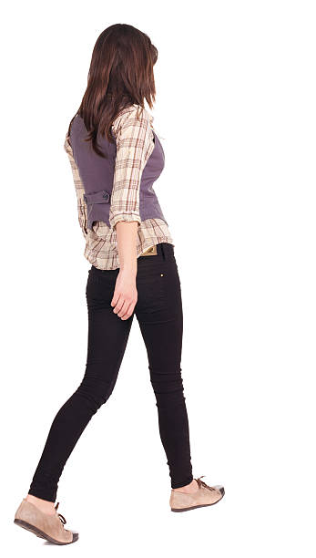 istock back view of going woman . 177375077