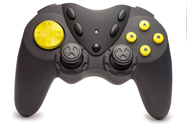 black game controller mit gelben knöpfen. - video game gamepad black isolated on white stock-fotos und bilder