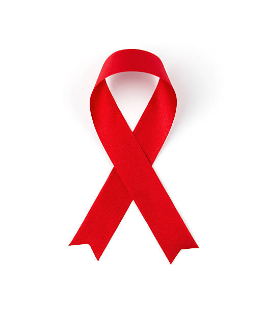 ruban rouge - aids awareness ribbon photos et images de collection