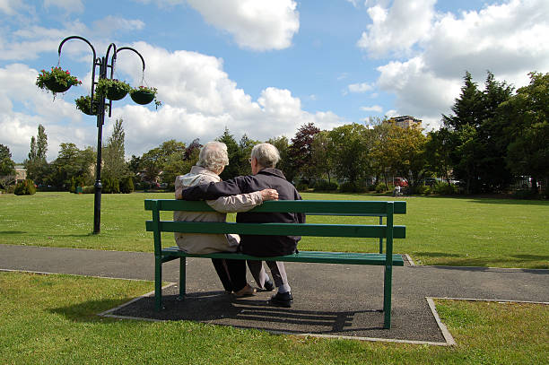 istock Senior couple on a park bench 177376587