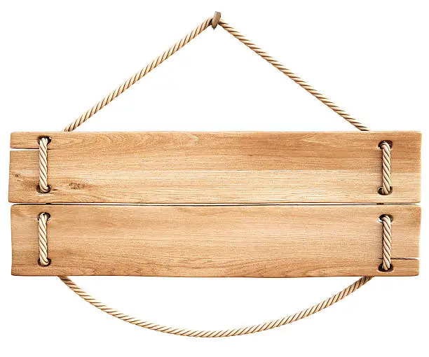 Photo of A wooden plank sign held by a rope