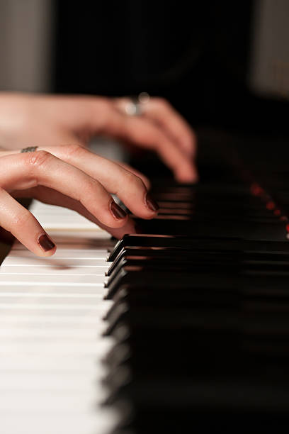 istock hands of a piano player 177377065
