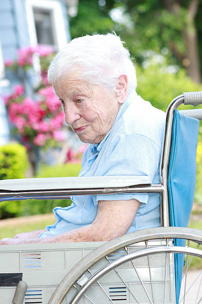 istock Senior lady in wheel chair 177377192