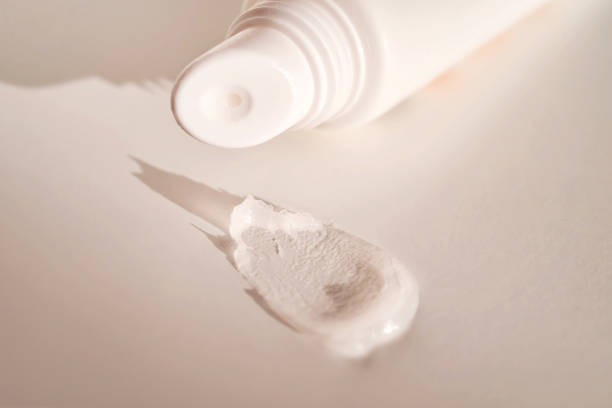 istock Hygienic moisturizing lip balm in a tube on a white background. 1773775892
