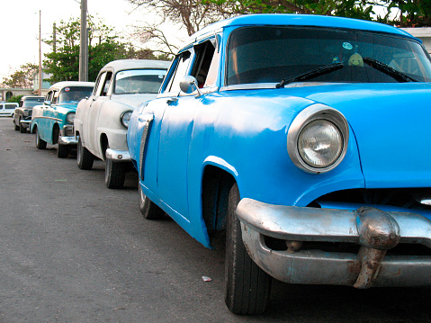 Four old cars from the 50s in Varadero Cuba.