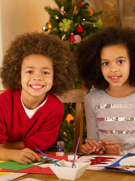 istock Mixed race children making Christmas cards 177378199