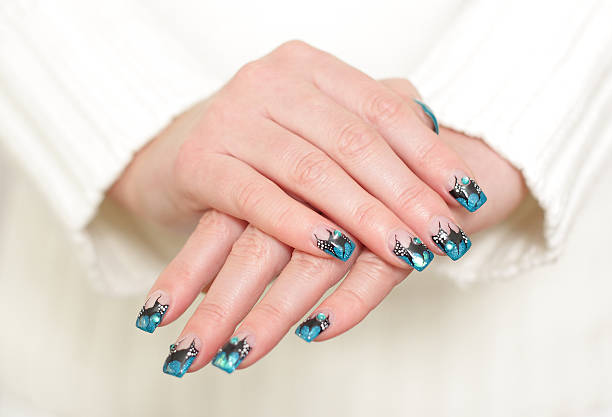 istock Female hands with blue manicure 177378330
