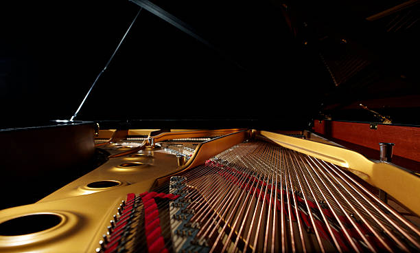 grand piano from inside stock photo