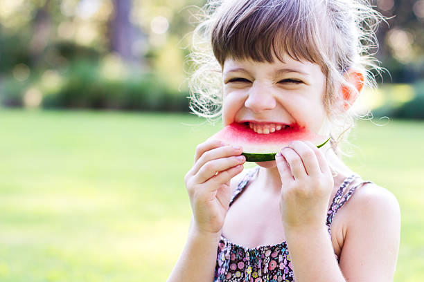 istock little girl eating watermelon 177378769