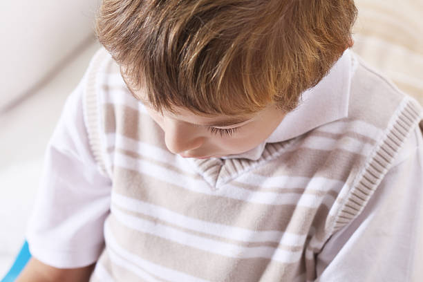 istock Portrait of sad boy 177379709