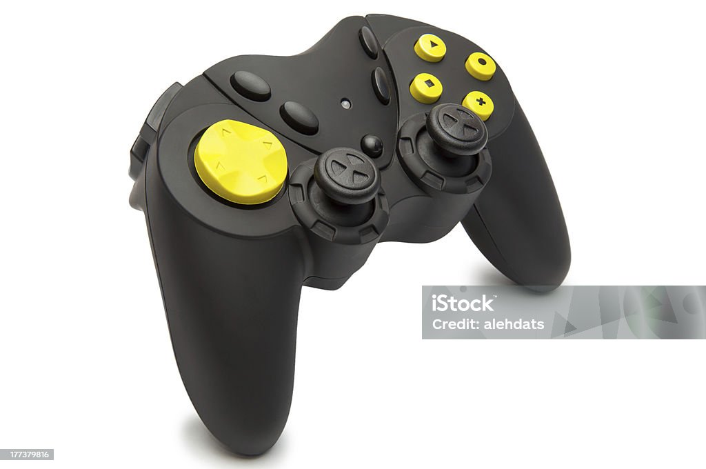 Negro, controlador de juego con botones de color amarillo. - Foto de stock de Videojuego libre de derechos