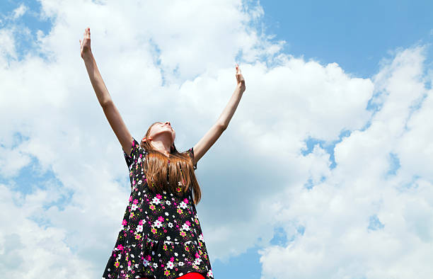 istock Teen girl with raised hands 177379943