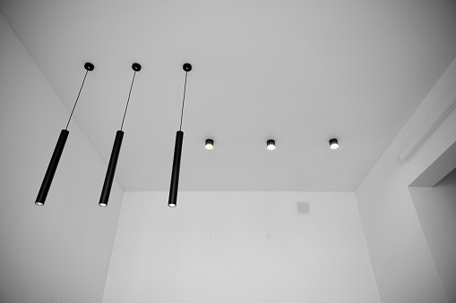 LED lights on the ceiling in an empty apartment