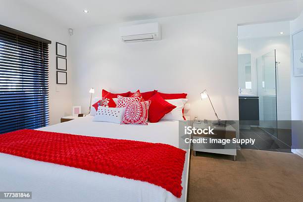 Master Bedroom Decorated In White With Red Accents Stock Photo - Download Image Now - Australia, Owner's Bedroom, Apartment