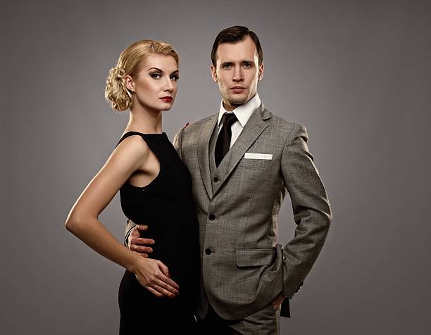 istock A retro couple together against a gray background  177381854