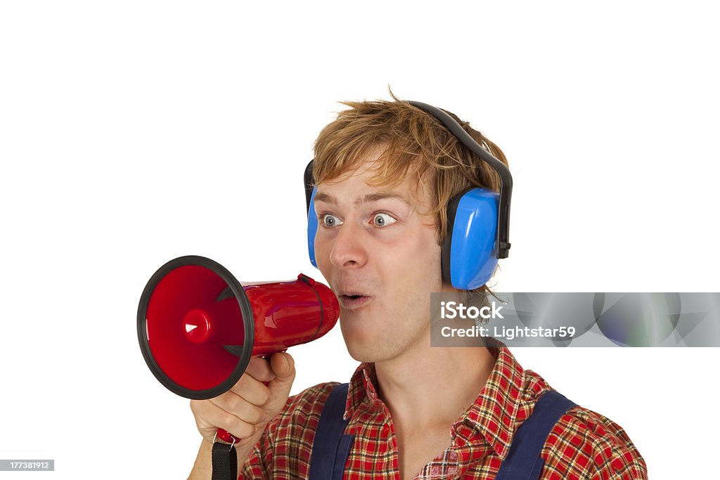 Attention Young handcrafter with megaphone isoladet on white background Adult Stock Photo