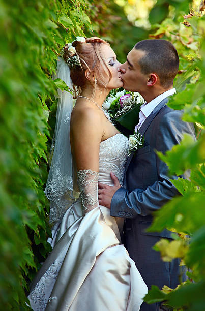 Young wedding couple on background old castle. Property Release uploaded for Castle