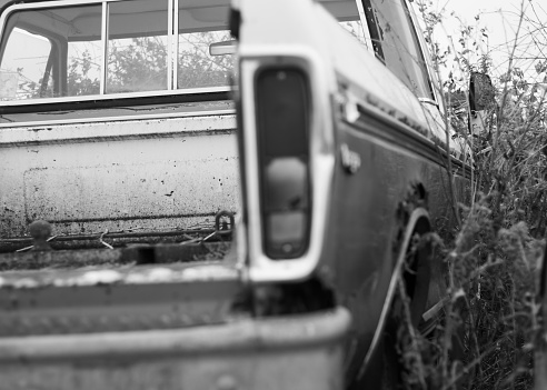 old rusted cars and trucks\ncanon 50mm