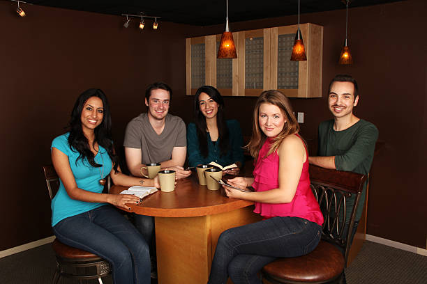 istock Young Adults Bible Study with Diverse Group of Friends 177384655