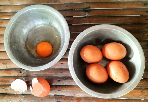 Cracking the egg - food preparation.