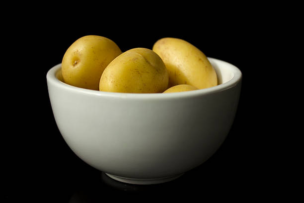 Bowl of Potatoes stock photo