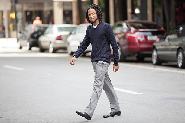 istock Man crossing the street 177385137