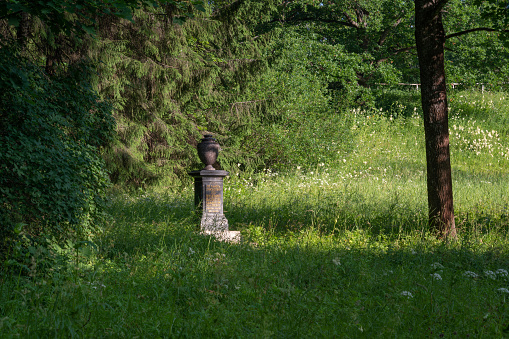 Pavlovsk, Saint Petersburg, Russia, 07.08.2023: Stone vase in honor of the arrival of Prince Frederick William of Prussia, the future King Frederick William II in Pavlovsky Park on a sunny summer day