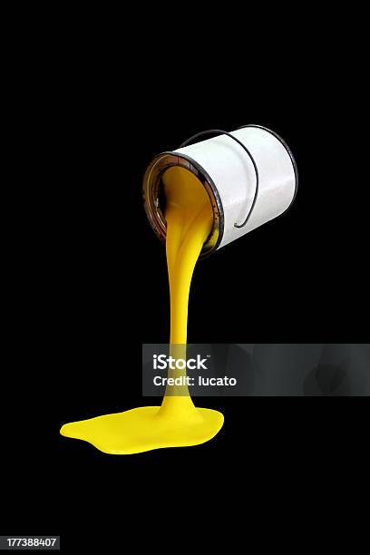 Paint Can Yellow Stock Photo - Download Image Now - Paint, Pouring, Spilling