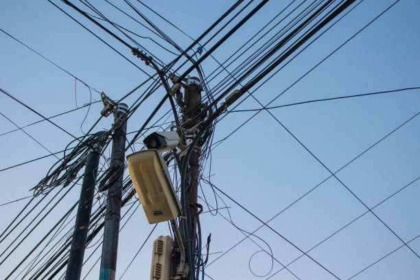 istock Electric cables, complicated internet cables on poles 1773890471