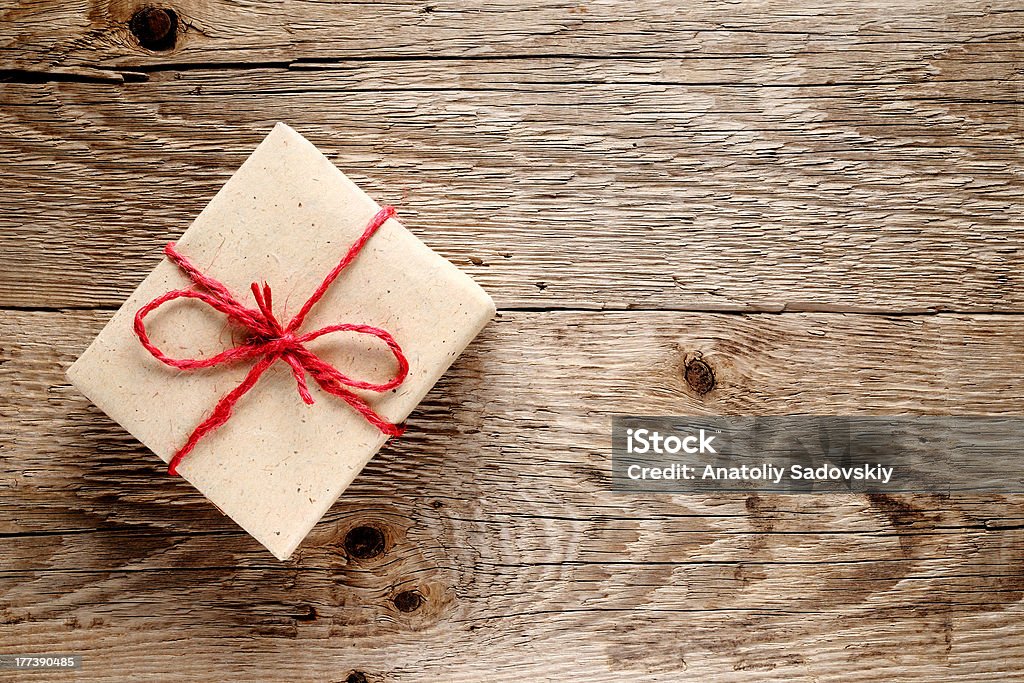 Vintage gift box Vintage gift box on wooden background Birthday Stock Photo