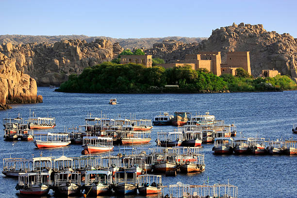 The Temple of Philae on Agilkia Island Egypt. Aswan. Agilkia Island (or Agilika Island) in Lake Nasser. Philae Temple of Isis seen from the Aswan Low Dam temple of philae stock pictures, royalty-free photos & images