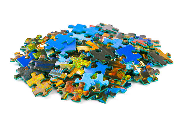 morceaux de casse-tête - portion blue jigsaw puzzle puzzle photos et images de collection