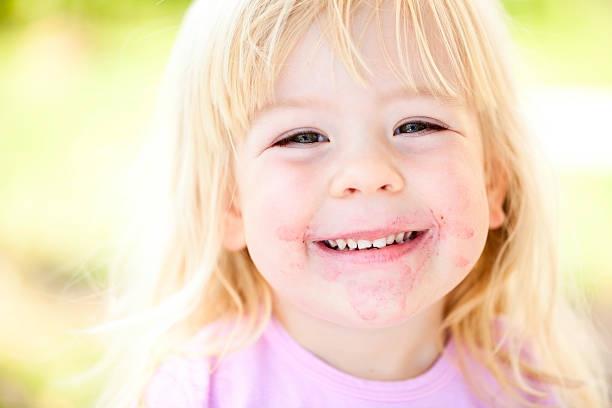 istock Three Years Old Smiling Girl Dirty Around Mouth 177394133