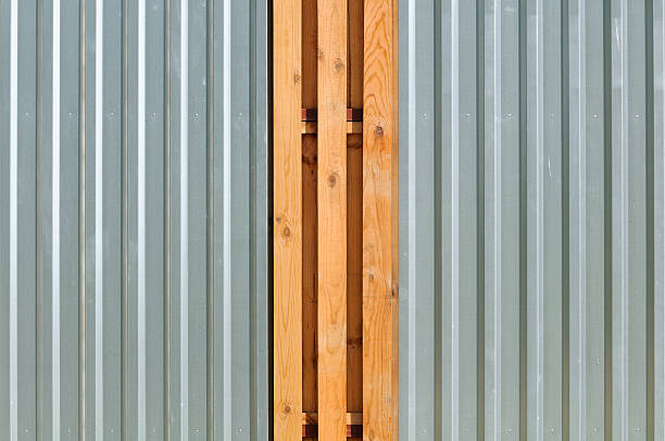istock Metal Fence with Wood Inserts 177394299