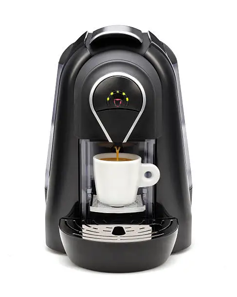 Photo of A black coffee maker with green LED lights