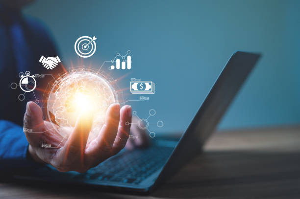 istock Businessman confidently holds globe, symbolizing global reach, influence harness power of electronic, cloud computing technologies to manage large amounts of information, drive worldwide enterprise 1773956747