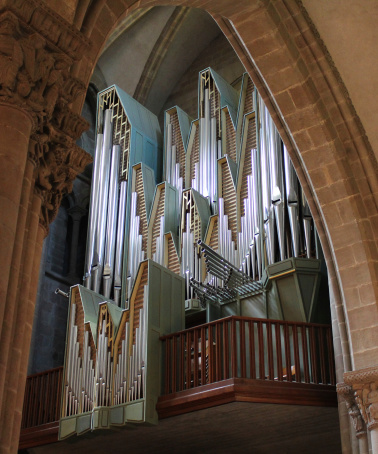 Pipe organ in an old church in Scotland seen through porch