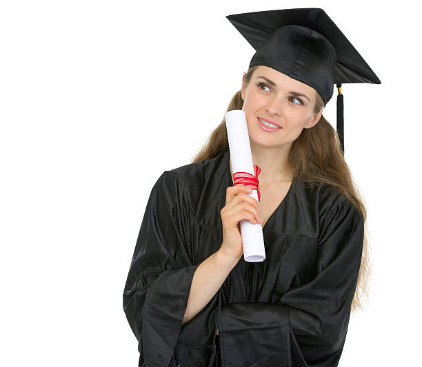 istock Thoughtful graduation woman with diploma looking on copy space 177396119