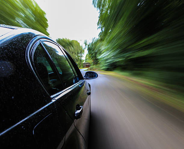 istock black car in very fast drive 177398999