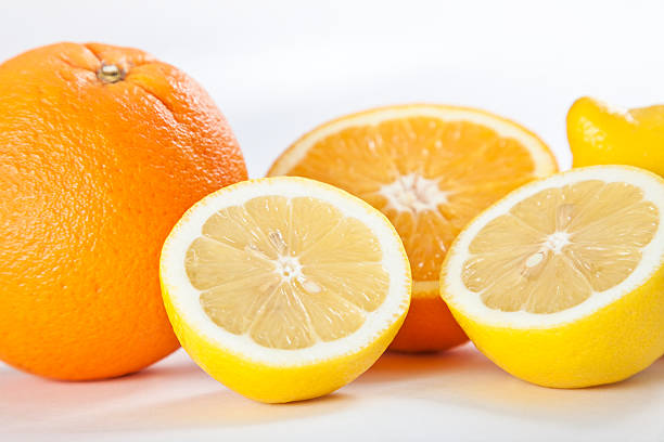 Lemons and oranges. stock photo