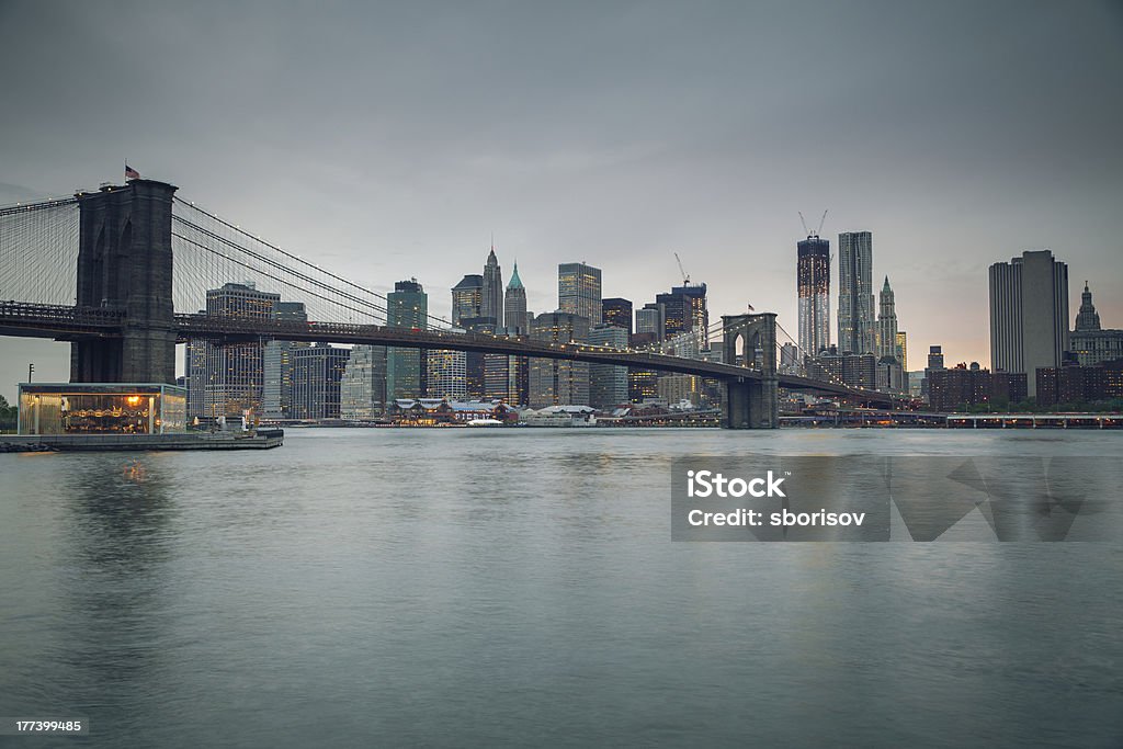 Brooklyn bridge and Manhattan at dusk "Brooklyn bridge at dusk, New York City" Architecture Stock Photo