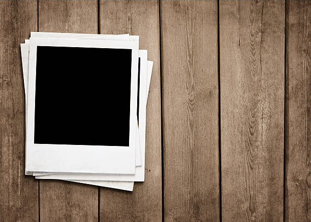istock Blank photos at wooden background 177400002