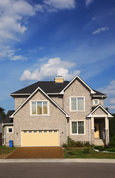 istock New two-storied cottage with garage. 177400274