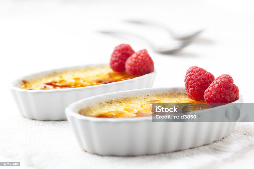 Creme Brulee Creme brulee with raspberries. Creme Brulee Stock Photo