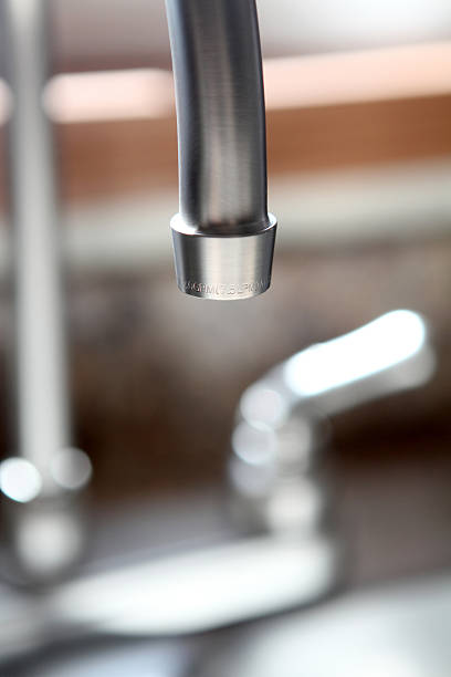 Silver Sink Faucet In New Home, Macro Shot stock photo