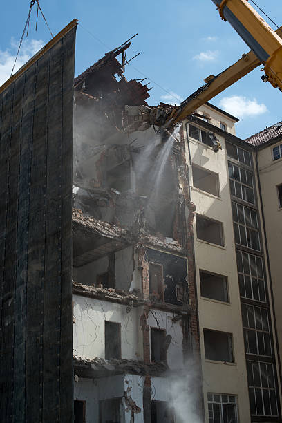 istock Demolition cranes dismantling a building 177401179